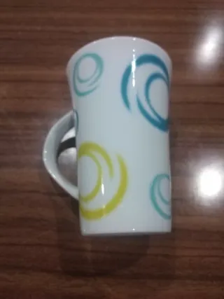 Caneca alta em porcelana com design