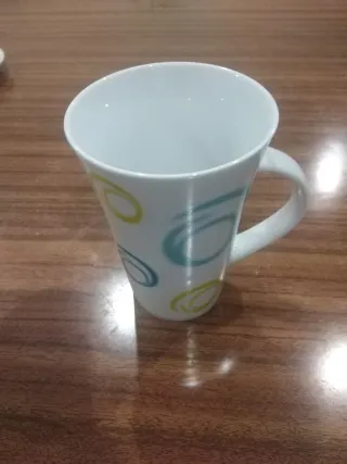 Caneca alta em porcelana com design