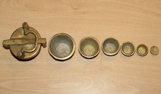 Ponderal 7 vasos bronce completo Alemania XIX