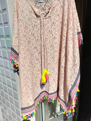 Copricostume pizzo rosa con nappe