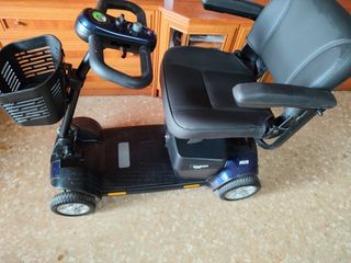 Scooter Ibiza + cargador .