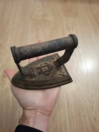 Plancha antigua de hierro