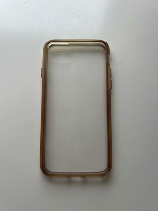 iPhone 8 blanco y plata con 2 fundas