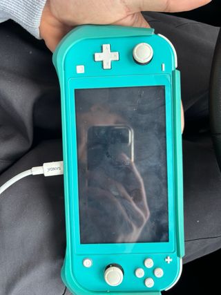 Nintendo Switch Lite Verde, escucho precios