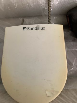 Tenda a rullo beige e bianco