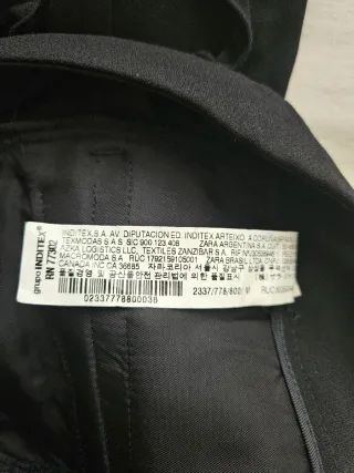 Pantalón Zara pinza volantes negro