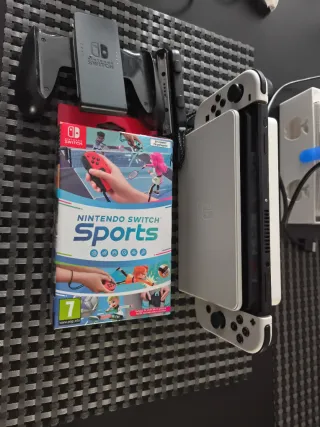 Nintendo Switch OLED Blanca y juego switch sports