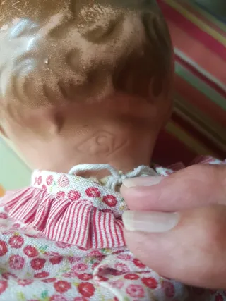 Muñeco antiguo de tela y  terracota