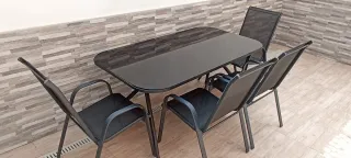 Mesa de cristal para patio + 4 sillas