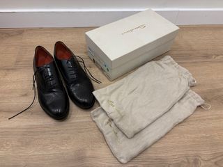 Zapatos planos negros de vestir