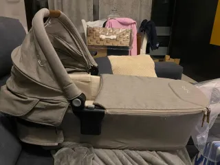 Nuna Triv Next + capazo + burbuja lluvia