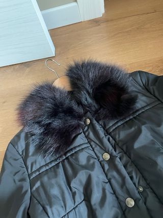 Cappotto nero con pelliccia