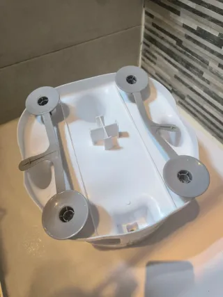 Silla de baño para bebé con juguetes y ventosas