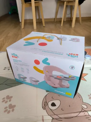 Silla de baño para bebé con juguetes y ventosas