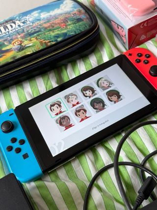 Nintendo Switch + Accesorios y Pokemon Espada