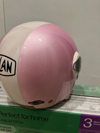 Casco Nolan rosa y blanco