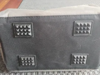 Bolsa Dexter y herramientas de la foto