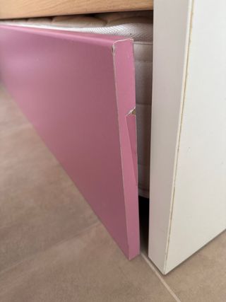 Cama nido rosa y blanca