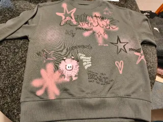 Sudadera niña gris y rosa graffiti