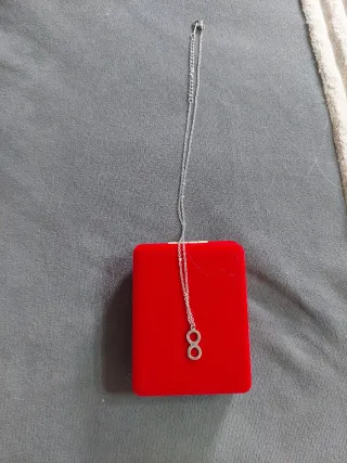 Colgante original con infinito invertido acero