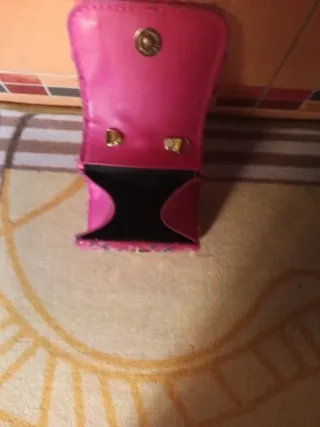 Bolso de lentejuelas rosa con perlas