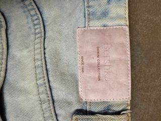 Pantalones vaqueros desgastados