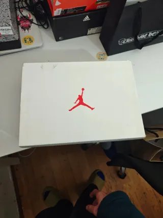 Jordan 4 Metallic Red