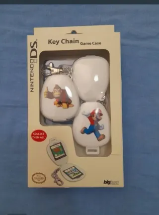 NUEVO. Fundas y Llaveros Nintendo DS