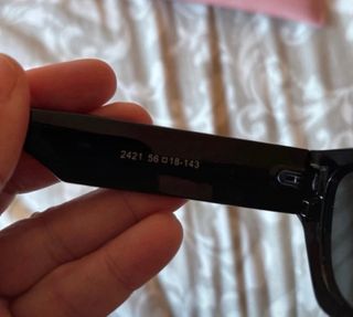 Gafas de sol Miu Miu negras