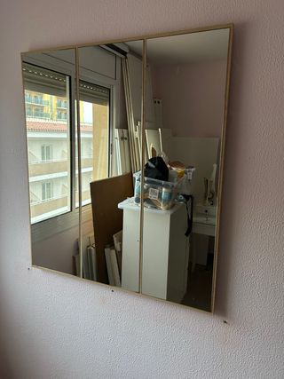 Espejo de pared dorado