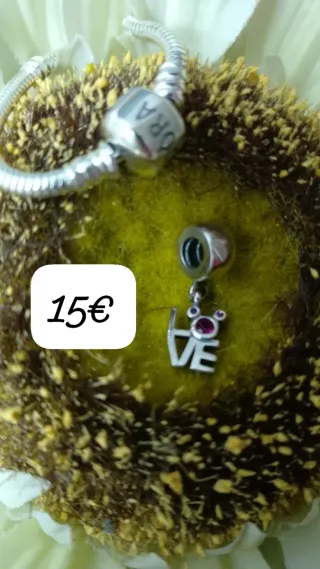 Abalorio plata ley buho 15€