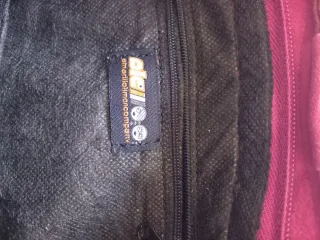 Bolso de hombro rosa y morado