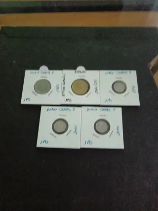 14 Monedas: 1 Isabel II Filipinas y 13 España