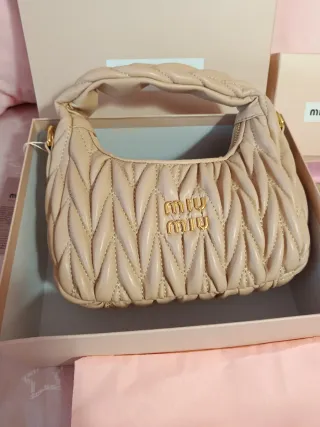 Bolso y cartera beige