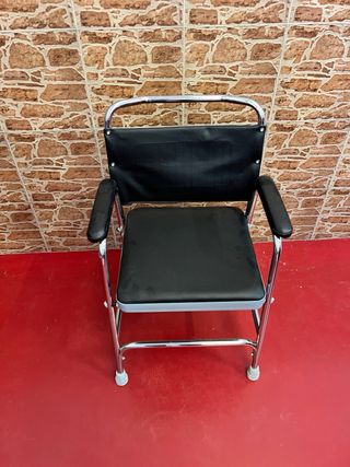 Sillón con inodoro plegable