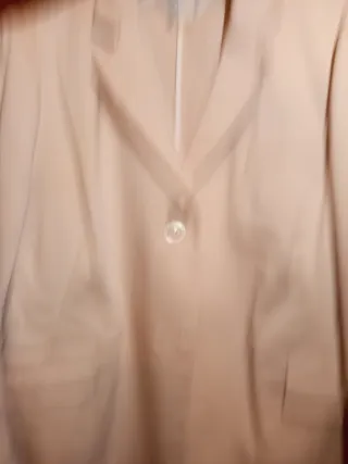Traje chaqueta rosa maquillaje