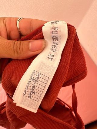 Body rojo con cordones a los costados