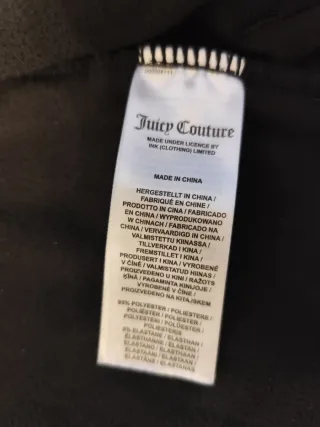 Tuta Juicy Couture nera con strass