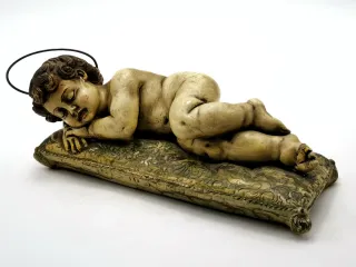 Antigua figura religiosa Niño Jesús durmiendo
