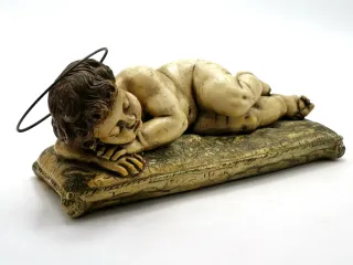 Antigua figura religiosa Niño Jesús durmiendo