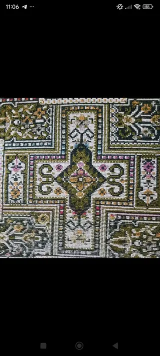 Alfombra decorativa con flecos