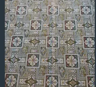 Alfombra decorativa con flecos