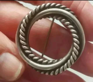 Llavero y broches plata de ley