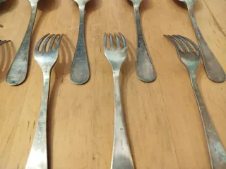 Juego 12 cubiertos baño plata