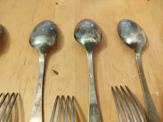 Juego 12 cubiertos baño plata