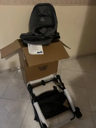 Carrozzino passeggino grigio