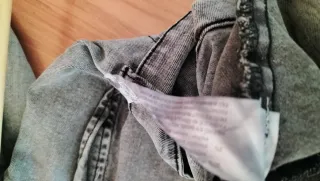 Vestido vaquero con cinturón y volante