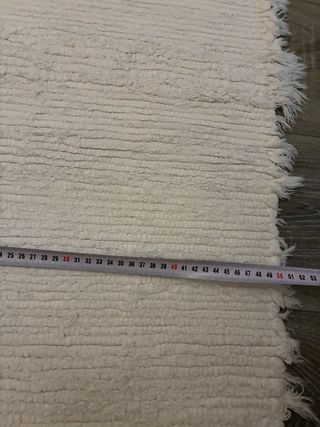 2 alfombras blancas de tela