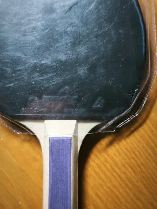 Palas de ping pong y pelotas, sin usar