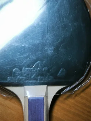 Palas de ping pong y pelotas, sin usar